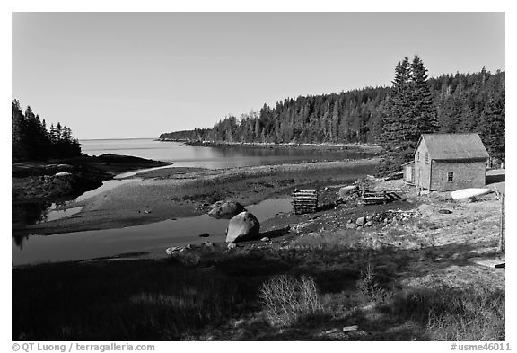 Schacks and inlet. Isle Au Haut, Maine, USA (black and white)