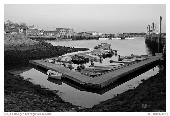 Small boat harbor at sunset. Stonington, Maine, USA (black and white)
