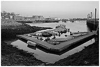 Small boat harbor at sunset. Stonington, Maine, USA ( black and white)