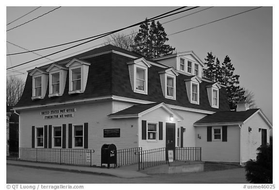 Post office in federal style at dusk. Stonington, Maine, USA