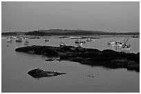 Harbor and Penobscott Bay islands at dusk. Stonington, Maine, USA ( black and white)