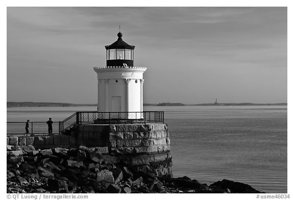 Children and Bug Light. Portland, Maine, USA (black and white)