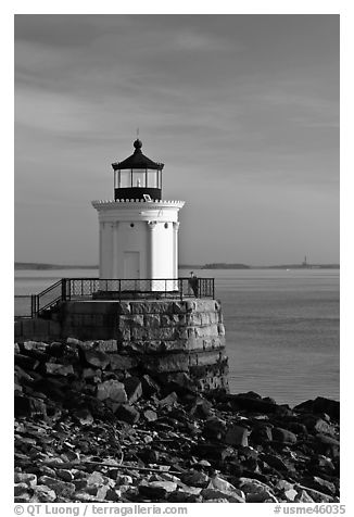 Bug Light with boy running. Portland, Maine, USA (black and white)