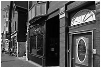 Colorful buildings and sidewalk. Portland, Maine, USA ( black and white)