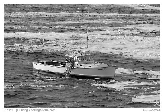 Fishermen on lobster boat. Bar Harbor, Maine, USA