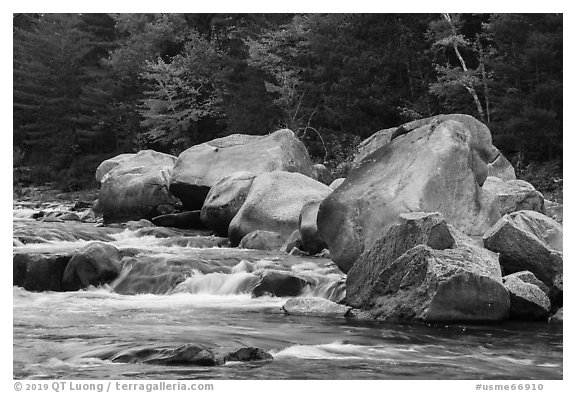 Whitewater of Wassatotaquoik Stream with boulders at Orin Falls. Katahdin Woods and Waters National Monument, Maine, USA (black and white)