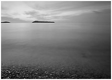 Islands in Lake Superior at dawn. USA ( black and white)