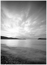 Clouds, surf, and islands near Grand Portage, sunrise. Minnesota, USA (black and white)