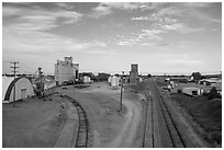 Railroad, grain elevator, and fertilizer plant, Bowman. North Dakota, USA (black and white)
