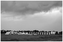 Storm clouds over grain silos. North Dakota, USA (black and white)