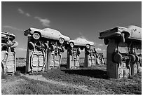 Vintage American automobiles forming replica of Stonehenge. Alliance, Nebraska, USA (black and white)