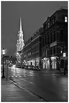 White-steepled Church and street with brick buildings by night. Portsmouth, New Hampshire, USA ( black and white)