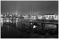 Pier and skyline by night. Portsmouth, New Hampshire, USA ( black and white)