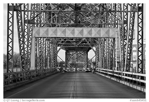 Roadway and lift bridge opening. Portsmouth, New Hampshire, USA (black and white)