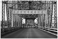 Roadway and lift bridge opening. Portsmouth, New Hampshire, USA (black and white)