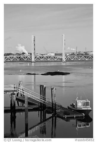 Small baot Bridges over Portsmouth river estuary. Portsmouth, New Hampshire, USA (black and white)