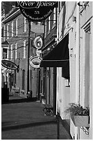 Sidewalk and waterfront buildings. Portsmouth, New Hampshire, USA ( black and white)