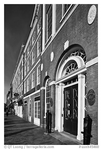 Sidewalk and row of brick buildings. Portsmouth, New Hampshire, USA