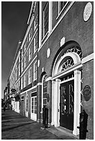 Sidewalk and row of brick buildings. Portsmouth, New Hampshire, USA ( black and white)