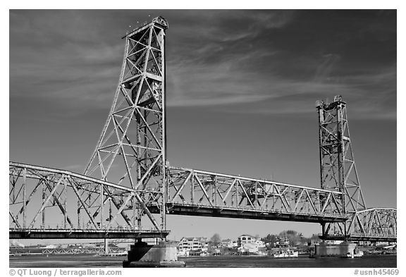 Vertical lift bridge moving upwards. Portsmouth, New Hampshire, USA (black and white)