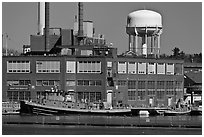 Tugboats and brick buildings, Naval Shipyard. Portsmouth, New Hampshire, USA ( black and white)