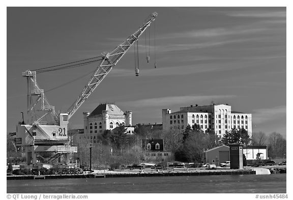 Crane and former prison called The Castle. Portsmouth, New Hampshire, USA (black and white)