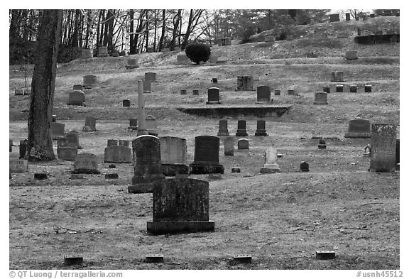 Headstones of different sizes in cemetery. Walpole, New Hampshire, USA (black and white)