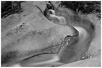 Water cascade over smooth rock, Franconia Notch State Park. New Hampshire, USA (black and white)