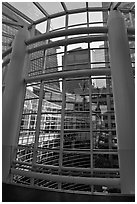 Looking through glass windows from One Beacon Court. NYC, New York, USA (black and white)