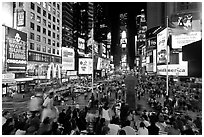 Crowds on Times Squares at night. NYC, New York, USA ( black and white)
