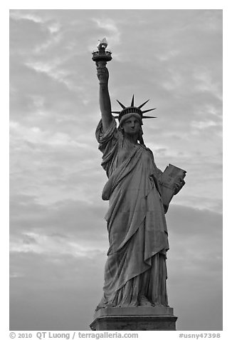 Statue of Liberty with lit torch, Statue of Liberty National Monument. NYC, New York, USA