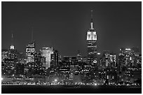 Mid-town Manhattan skyline by night. NYC, New York, USA (black and white)