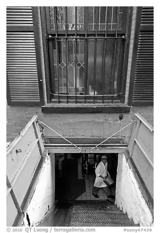 Restaurant basement seen from street. NYC, New York, USA (black and white)