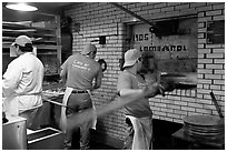 Pizza preparation, Lombardi pizzeria kitchen. NYC, New York, USA (black and white)