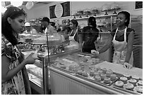 Cupcakes sold in bakery. NYC, New York, USA (black and white)