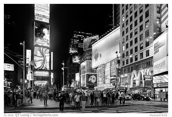Times Square with Renaissance New York Times Square Hotel (Two Times Square) at night. NYC, New York, USA (black and white)