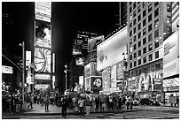 Times Square with Renaissance New York Times Square Hotel (Two Times Square) at night. NYC, New York, USA (black and white)