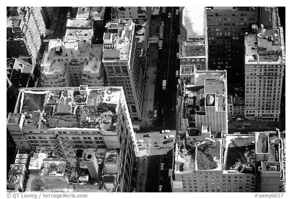Canyon-like streets and yellow cabs seen from the Empire State building. NYC, New York, USA (black and white)