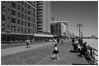 Appartment buildings, boardwalk, and beach, Coney Island. New York, USA ( black and white)