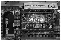 Stonewall Inn facade at dusk, Stonewall National Monument. NYC, New York, USA ( black and white)