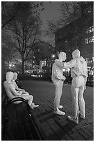 Gay Liberation sculpture by George Segal at night, Stonewall National Monument. NYC, New York, USA ( black and white)