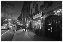 Christopher Street and Stonewall Inn at night, Stonewall National Monument. NYC, New York, USA ( black and white)