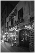 Stonewall Inn building at night, Stonewall National Monument. NYC, New York, USA ( black and white)