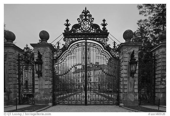 Entrance gate of the Breakers mansion at dusk. Newport, Rhode Island, USA (black and white)