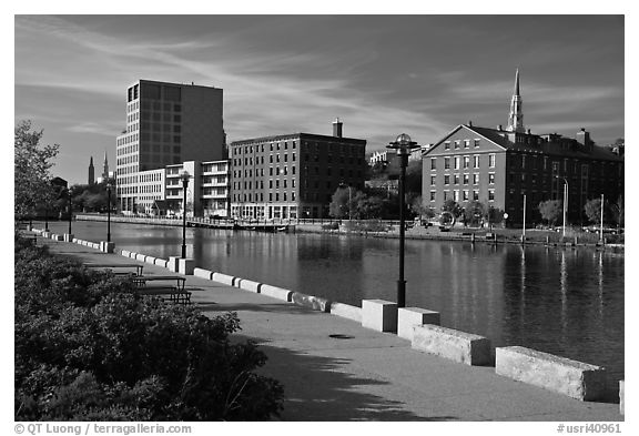 Brick buildings reflected in Seekonk river, late afternoon. Providence, Rhode Island, USA (black and white)