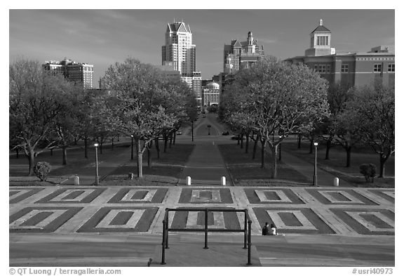 Gardens of State House with couple sitting on stairs. Providence, Rhode Island, USA