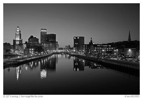 Wide view of downtown buildings reflected in Seekonk river at dusk. Providence, Rhode Island, USA