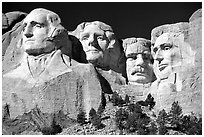 Faces of Four US Presidents carved in cliff, Mt Rushmore National Memorial. South Dakota, USA (black and white)