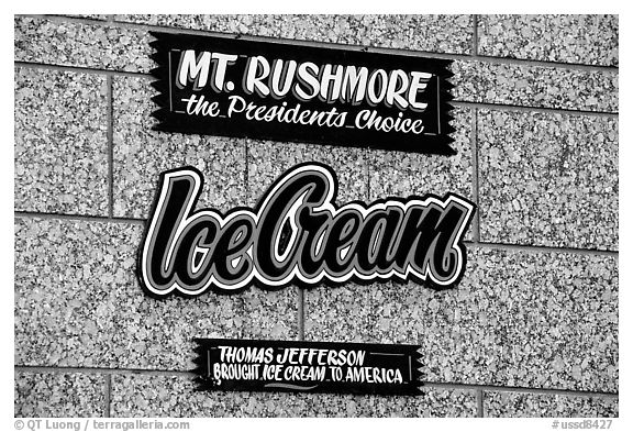 Sign about ice cream and presidents, Mount Rushmore National Memorial. South Dakota, USA (black and white)