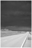 Storm cloud over road. South Dakota, USA (black and white)